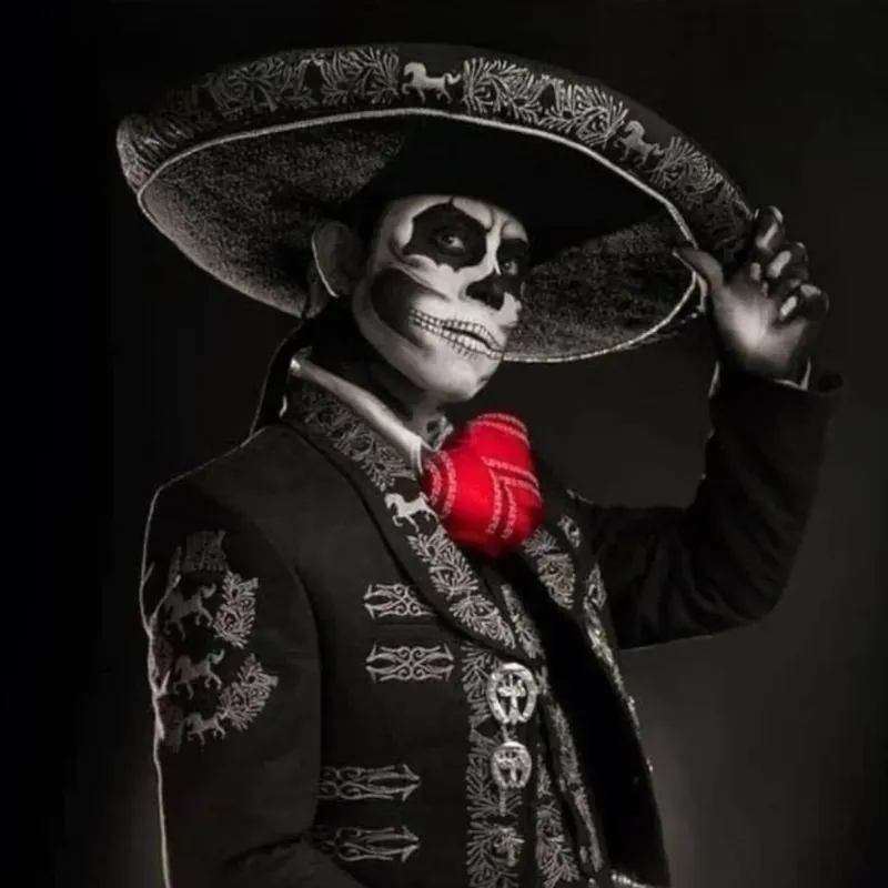 El Patron's brand image: a charro in calavera face paint tipping an embroidered sombrero